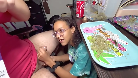 Amateur black and blonde smoking a cigarette on a webcam