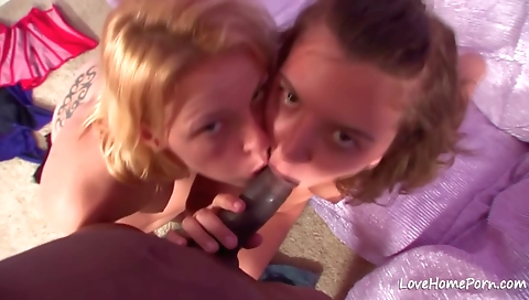 Blonde and brunette with big natural boobs have fun in a threesome