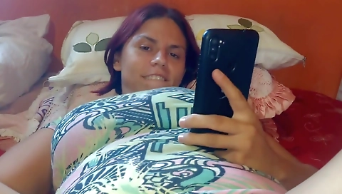 Hot redhead with a big booty and a big ass in a red dress