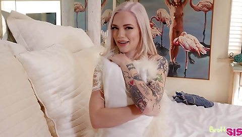 Blonde and her tattooed sister in an interracial video