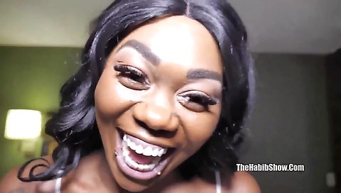 This video shows a tattooed ebony chick being fucked hard