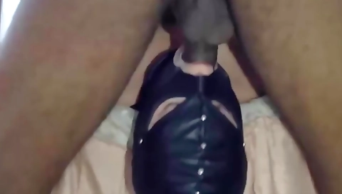 Hot milf with a mask sucking on her boyfriend's hard dick